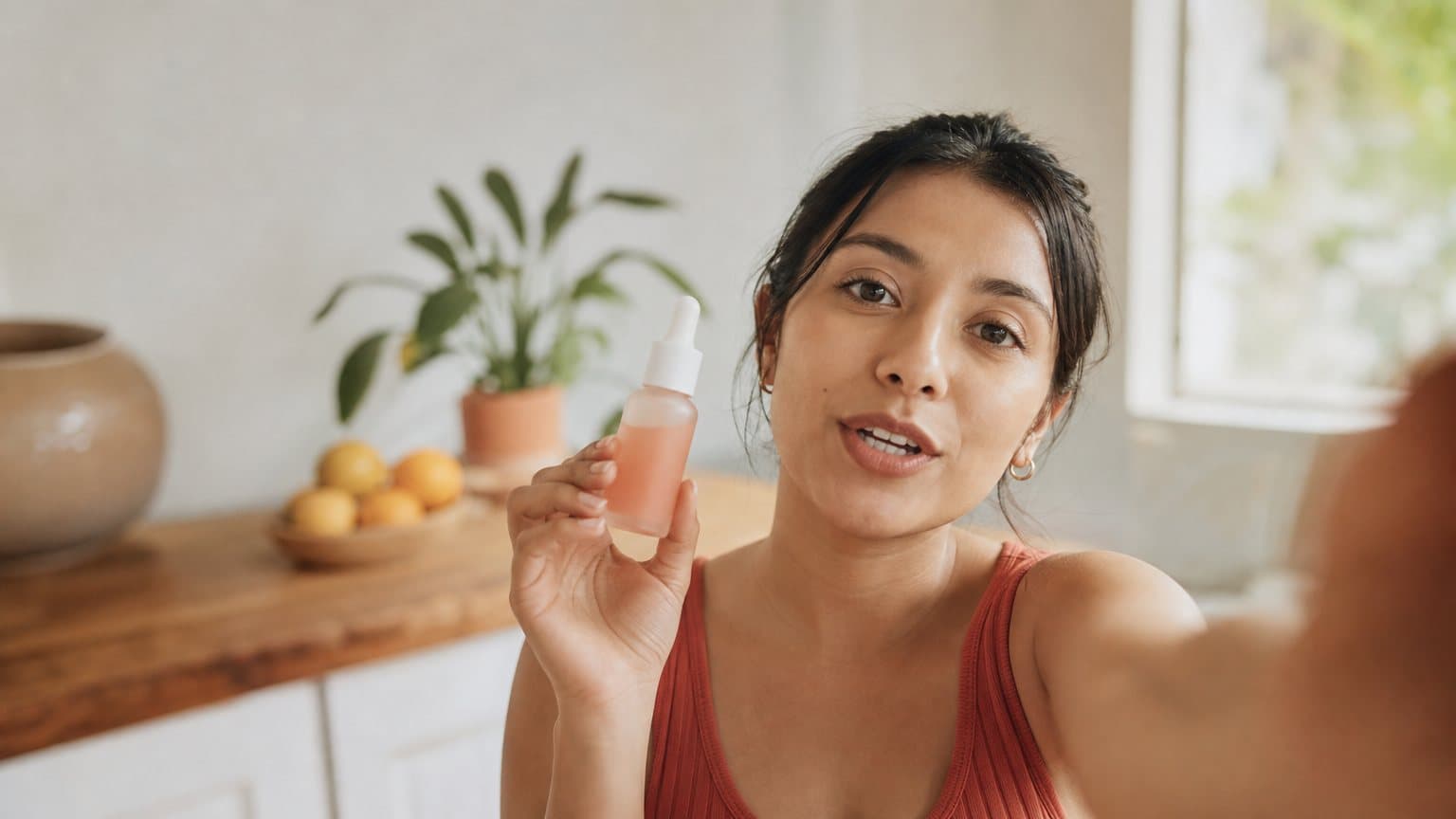 A phone-shot UGC-style ad of a person talking to camera about a product at home
